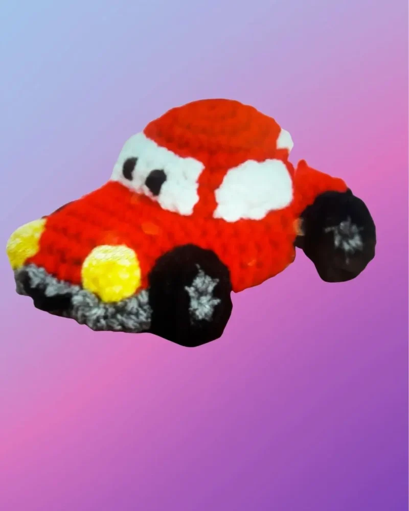 Crocheted toy car with attached wheels for pretend play