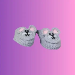 Handmade gray crochet mouse slippers for children with embroidered faces