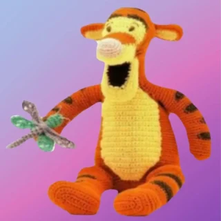 Handmade crochet Bouncy Tiger Amigurumi with removable dragonfly.