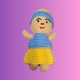 Small crocheted baby doll made to fit inside the crocheted cradle purse