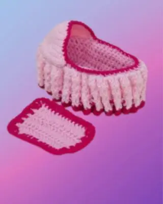 Crocheted cradle purse with matching blanket and drawstring-style closure