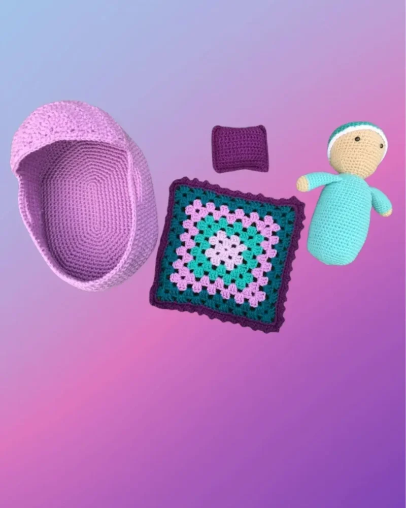 Crocheted cradle purse with matching blanket and drawstring-style closure