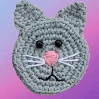 Crochet Cat Appliqué Handmade crochet cat appliqué for blankets, clothing, accessories, and custom crochet projects.