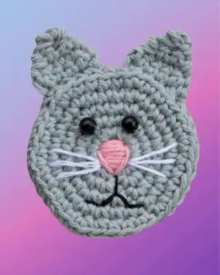 Crochet Cat Appliqué Handmade crochet cat appliqué for blankets, clothing, accessories, and custom crochet projects.
