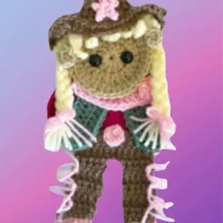Crochet Cowgirl Appliqué Handmade crochet cowgirl appliqué for blankets, clothing, accessories, and custom crochet projects.