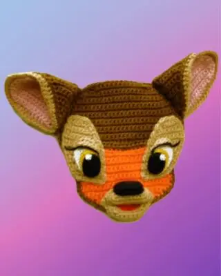 Crochet Deer Appliqué Handmade crochet deer appliqué for blankets, clothing, accessories, and custom crochet projects.
