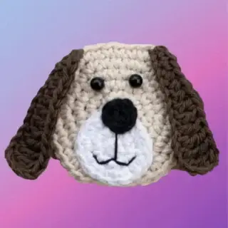 Crochet Dog Face Appliqué Handmade crochet dog face appliqué for blankets, clothing, accessories, and custom crochet projects.