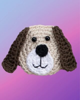Crochet Dog Face Appliqué Handmade crochet dog face appliqué for blankets, clothing, accessories, and custom crochet projects.