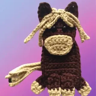 Crochet Horse Appliqué Handmade crochet horse appliqué for blankets, clothing, accessories, and custom crochet projects.