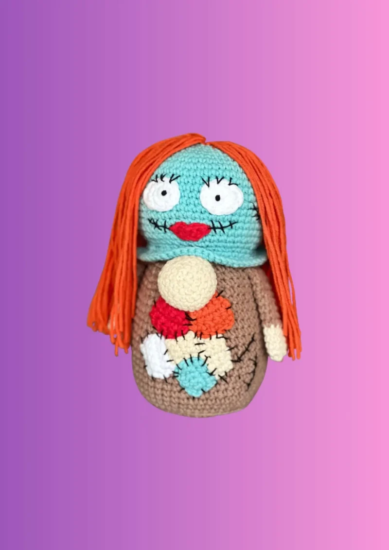 Handmade crochet patchwork doll stash container with long yarn hair and stitched details