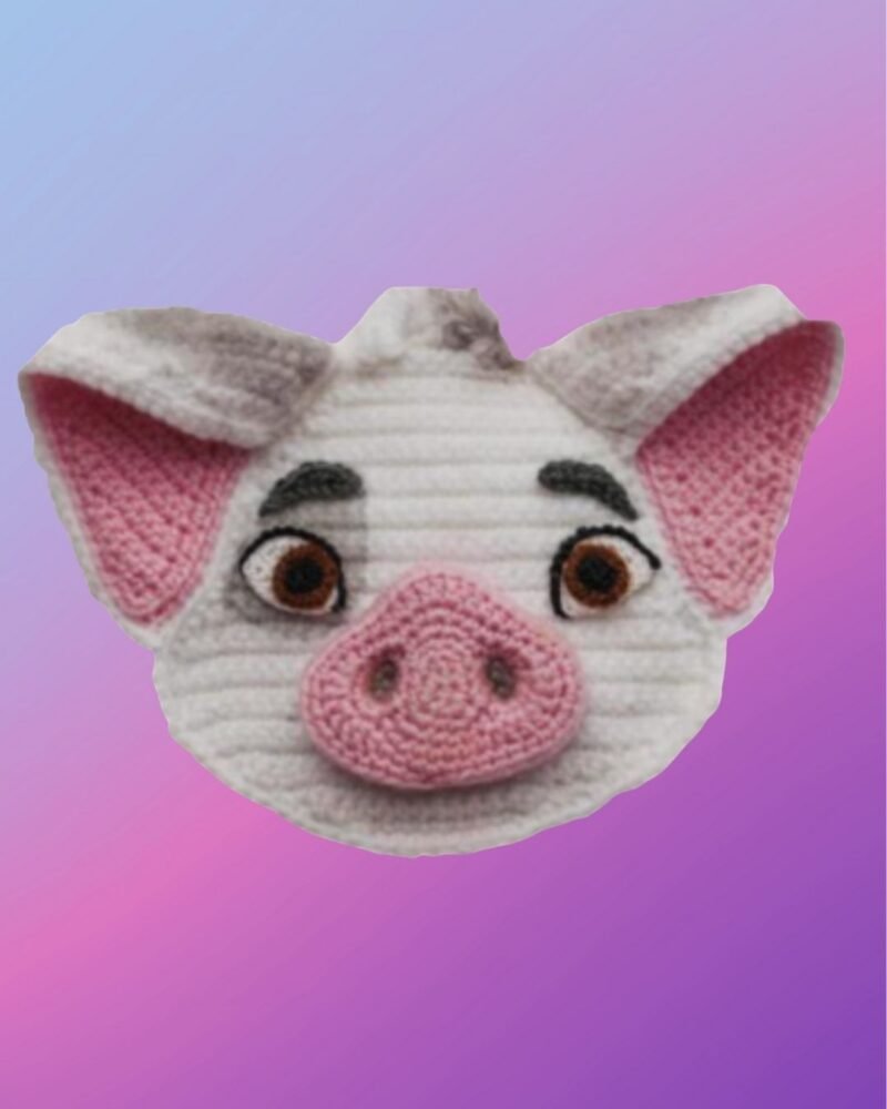 Handmade crochet pig appliqué for blankets, clothing, accessories, and custom crochet projects.