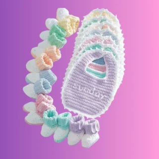 Handmade crochet baby bibs for each day of the week with matching pairs of baby booties
