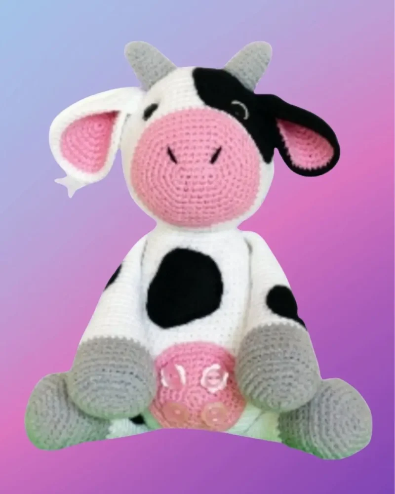 Handmade crochet Farm Cow Amigurumi with black and white markings by D's & B's Gifts.