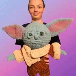 Handmade crochet Galaxy Friend Amigurumi with removable coat.