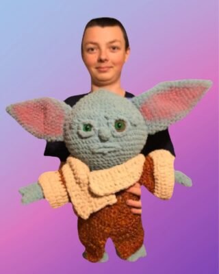 Handmade crochet Galaxy Friend Amigurumi with removable coat.