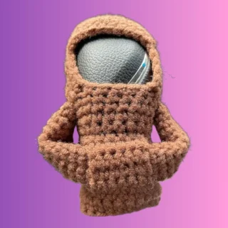 Handmade crochet gear shift cover with arms sewn into front pocket