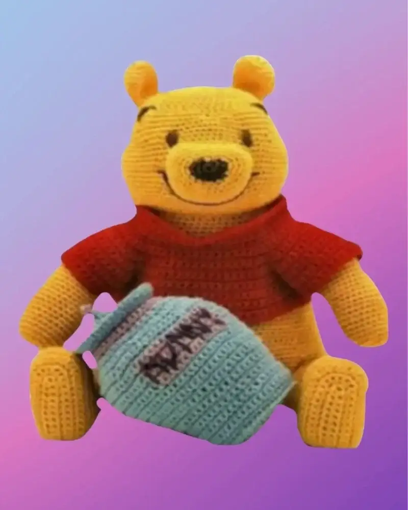 Handmade crochet Honey Pot Bear with removable shirt and honey pot.