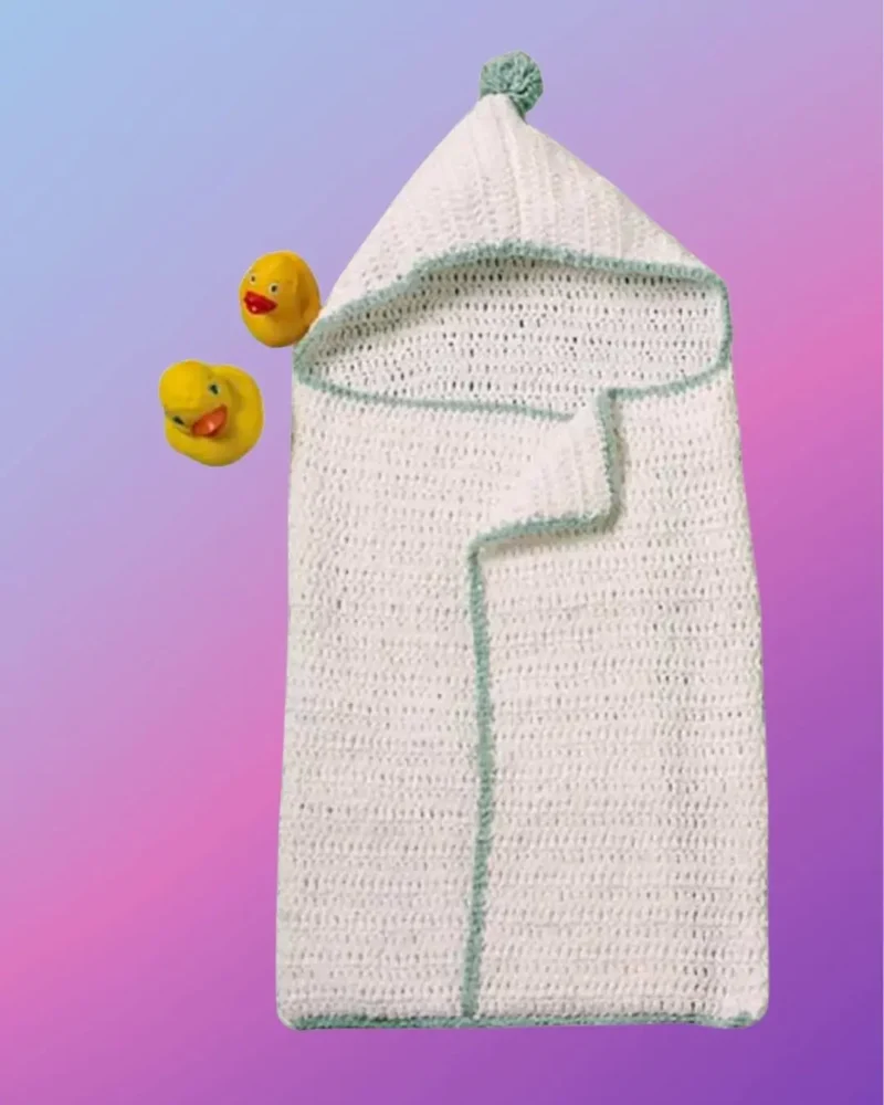 Handmade crochet baby hooded bath wrap with contrasting trim and pompom