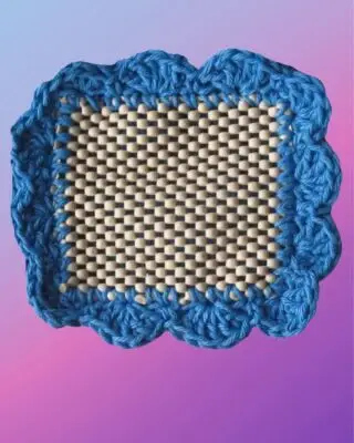 Handmade crochet jar opener with non-slip grip center