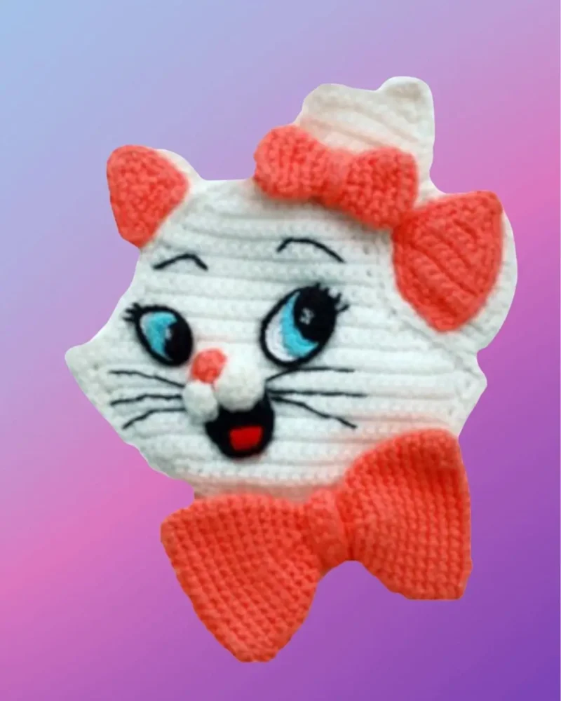 Handmade crochet kitty face appliqué with detailed facial features and bows
