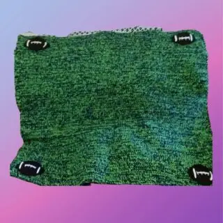 Crocheted lap blanket customized with football appliqués