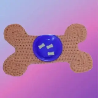 Crocheted bone-shaped dog food mat made from acrylic yarn