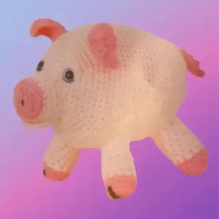 Handmade crochet Pig Amigurumi with curly tail.