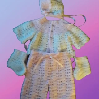 Handmade crochet shell stitch baby outfit with hat, shirt, pants and booties