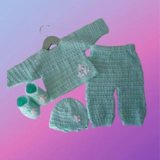 Handmade crochet baby outfit with shirt, pants, matching hat and booties