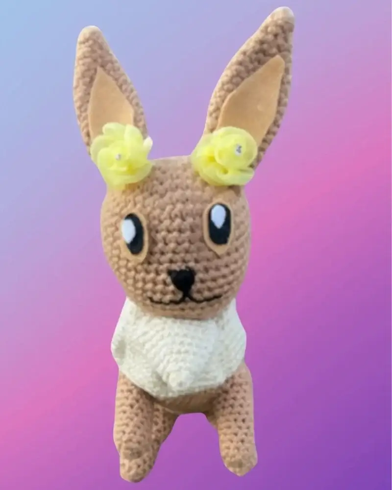 Handmade Woodland Friend with oversized ears and roses.
