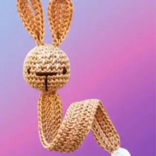 Crocheted bunny animal head bookmark with long body and white tail